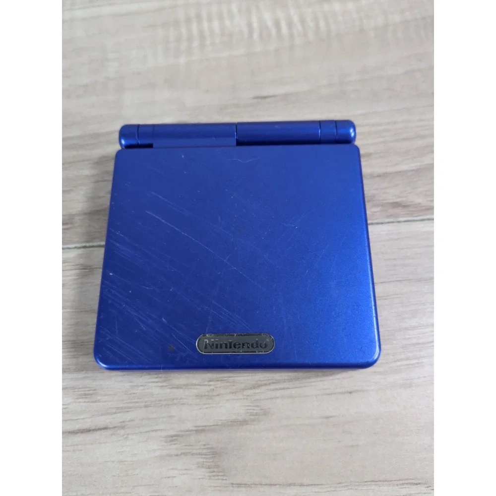 Nintendo Game Boy Advance SP Blue ( FOR PARTS OR NOT WORKING )